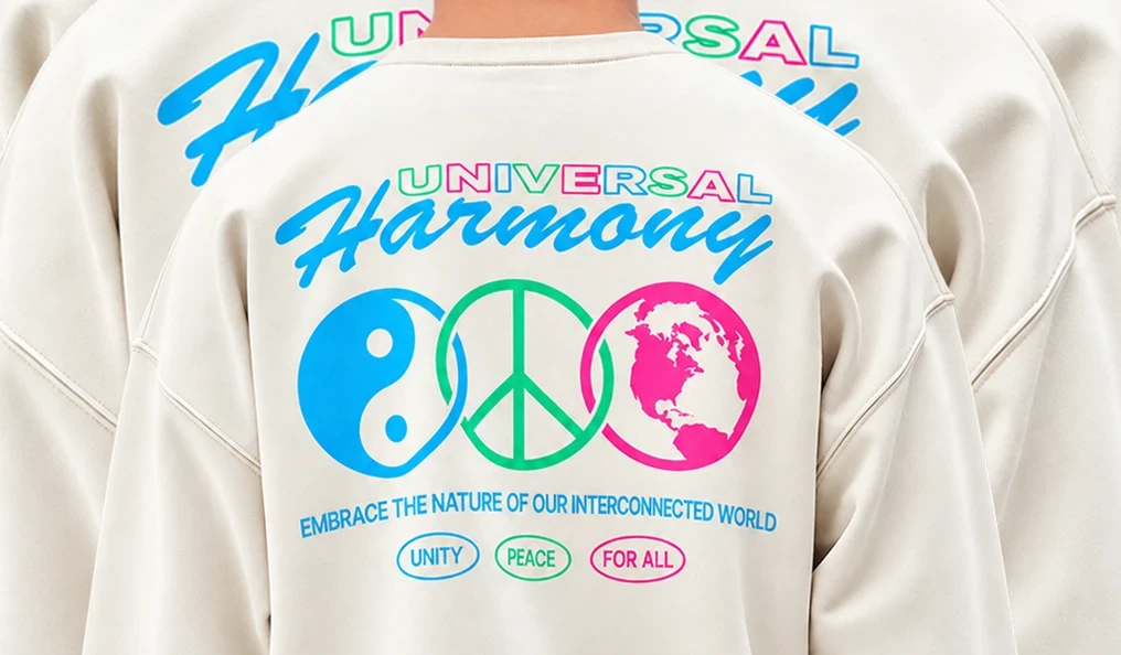 Cream PacSun sweatshirt featuring a colorful Universal Harmony graphic layered over a second sweatshirt.